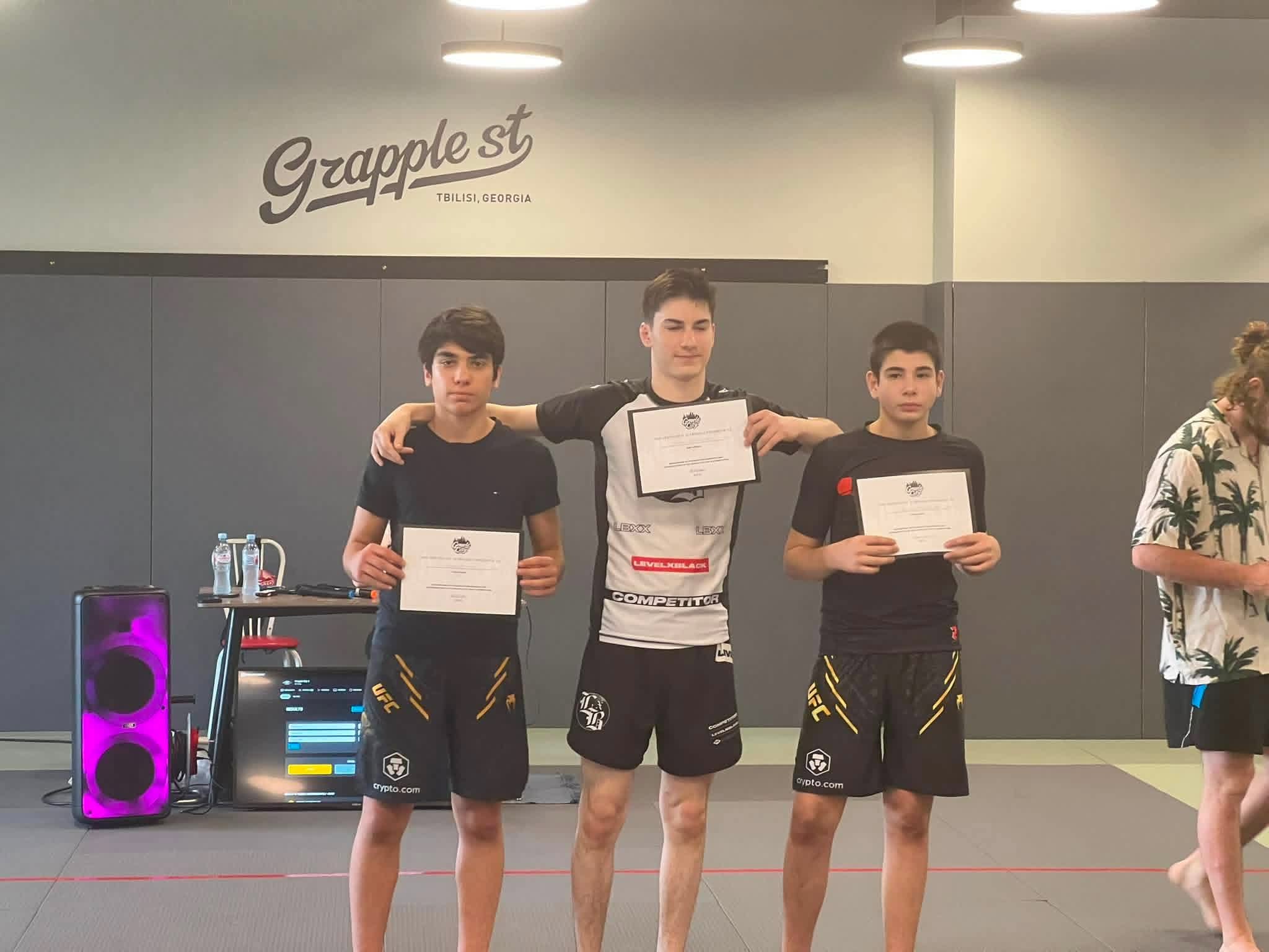 Young Davitferuli athletes after grappling competition